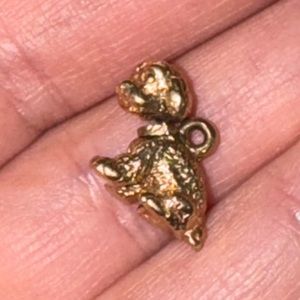 14k yellow gold figural dog charm with articulated bobble head